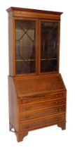 An Edwardian and satinwood banded bureau, the outswept pediment over a pair of astragal glazed doors