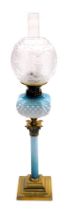 A late 19thC Young's duplex blue opalescent and brass oil lamp, of Corinthian column form decorated