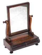 A Victorian mahogany swing frame toilet mirror, the base with a pair of small cushion drawers, raise