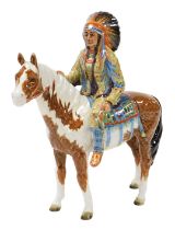 A Beswick pottery figure of a mounted native American Indian, on a skewbald horse, model 1391, print