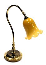 A Robin Electronics brass desk lamp, with a gold frilled glass shade, 48cm high.
