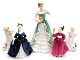 Five Royal Doulton figures, comprising Merry Christmas HN3096, Vanity HN2475, Debbie HN2385, Reward