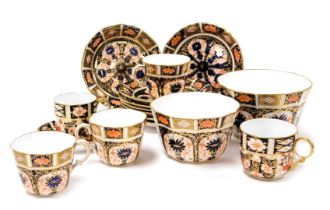 A group of Royal Crown Derby Imari porcelain, pattern no. 1128, comprising two graduated sugar bowls