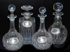 A pair of Victorian cut glass globe and shaft decanters, two further cut glass decanters, and four s