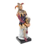 A Royal Doulton figure modelled as the Jester, HN2016.