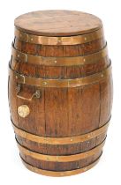 A 19thC copper bound oak barrel, with twin carrying handles, 64cm high.