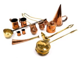 A group of Victorian and later copper and brass ware, including three spirit measures, for Brandy Wh