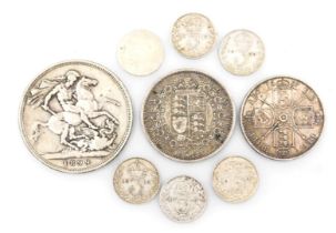 A group of Victorian and later silver coinage, to include an 1899 crown, George V three pence, Maund