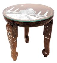 An Indian sheesham wood and bone inlaid occasional table, the circular top decorated with Taj Mahal,