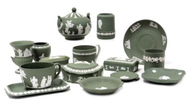 A group of Wedgwood green Jasperware, including trinket boxes and dishes, small vases, sucrier and c