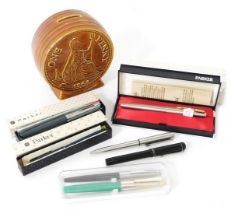 A Parker 61 Flighter Deluxe fountain pen, further fountain and ballpoint pens, and a pottery 1964 on