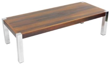 A late 20thC Dyrlund Danish rosewood coffee table, of rectangular form, raised on four metal corner