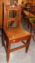 A late 18thC/early 19thC oak hall chair.