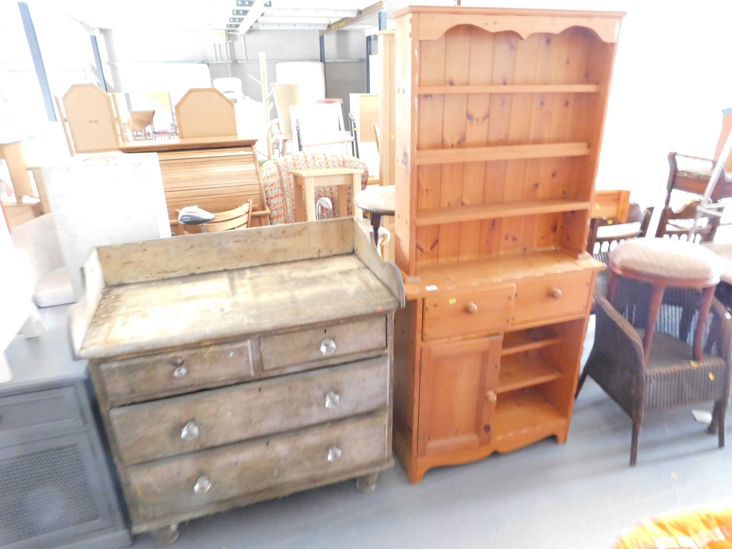 A small pine dresser, with plate rack to back over two doors, over two drawers, and another small pa