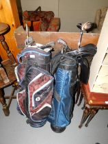 Two bags of golf clubs, to include Dunlop, System 2, etc. This lot is located at our additional pre