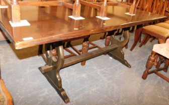 An dark elm Ercol style refectory table.