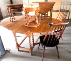 A group of furniture including a gate leg dining table, two dining chairs, small gate leg table, nes