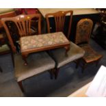 A Victorian oak nursing chair, with floral upholstered overstuffed seat and back, an oak stool with