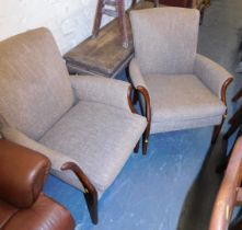 Two Parker Knoll armchairs.