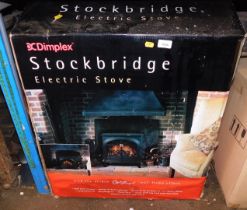 A Dimplex Stockbridge electric stove, boxed.