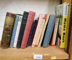 A small collection of books, including Puffin books, books include Wages, Three Men In A Boat and a