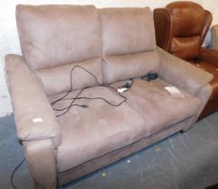 A light brown suede reclining two seater sofa.