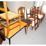A group of chairs, to include various oak chairs with cane seats, mahogany shield back chair, etc.