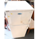 A Whirlpool fridge freezer. This lot is located at our additional premises SALEROOM SIX, Unit 6, El