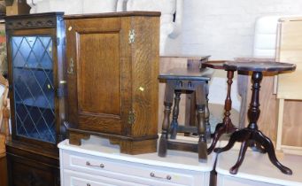 An oak Old Charm style corner cabinet, a 19thC oak corner cupboard, two reproduction wine tables and