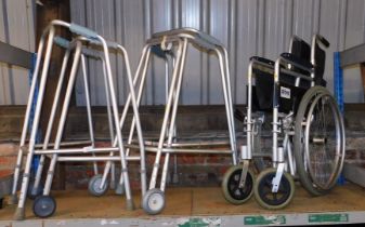 Four mobility walking aids and a collapsible Drive wheelchair.