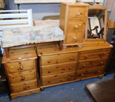 Various pine bedroom furniture, comprising six drawer chest, three drawer bedside, three drawer thin
