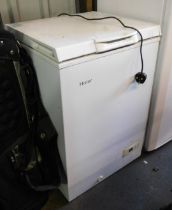 A Haier chest freezer.