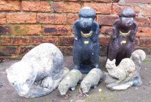 A group of garden ornaments, comprising three badgers, two poodles and a squirrel. (6)