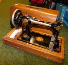 A vintage cased sewing machine.