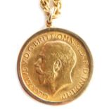 A George V gold sovereign 1913, in sprung pendant mount and yellow metal rope twist necklace marked