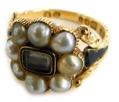 A George IV gold and pearl cluster memorial ring, with a central brass locket and surround of eight