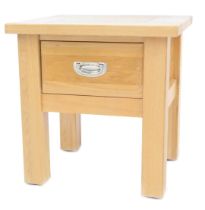 A Willis and Gambier oak bedside table, with frieze drawer, on stiles, 51cm high, 50cm wide, 44cm de