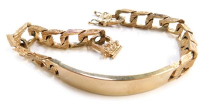 An Elizabeth II gold identity bracelet, with bark effect S shaped links, London 1991, 38.3g.