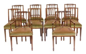 A set of ten George III style mahogany dining chairs, with over stuffed seats, raised on tapering sq