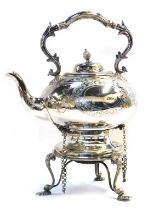 A Victorian silver plated kettle on stand, with an ornate ring handle, with ivory insulator, with ch