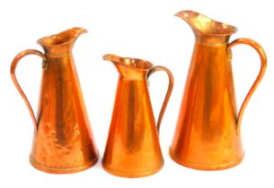 A set of three late 19thC Joseph Sankey copper graduated flagons, stamped to underside, the largest