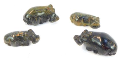 Four early 20thC carved hardstone hippopotamuses, the largest 9cm wide.