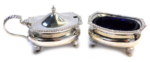 A George V silver part cruet, comprising open salt with blue glass liner, and lidded mustard pot, ea