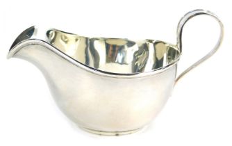 A George V silver cream jug, of plain form, James Dixon and Sons Ltd, Sheffield 1922, 1.98oz, 7cm hi