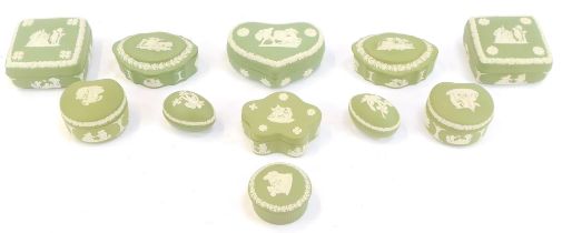 A group of green Wedgwood jasperware trinket boxes, of varying shapes, to include a square shaped bo