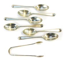 A set of six George V silver old English pattern teaspoons, London 1925, together with a pair of sil