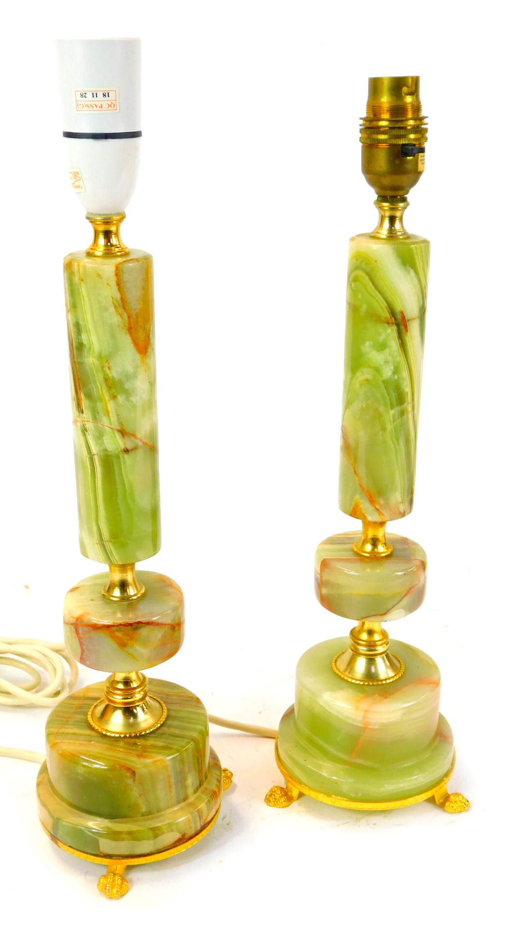 A pair of 20thC onyx and brass table lamps, 38cm high.