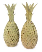 A pair of Art Deco style painted metal pineapples, 40cm high.