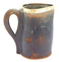 An early 20thC leather jug, with silver rim, stamped to underside Ross Winchester, Sheffield 1906, 1