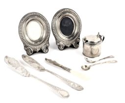 A group of small silver, to include an Edward VII silver mustard pot, with blue glass liner, a pair